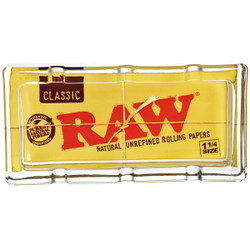 RAW Classic Pack Glass Ashtray, 6x3 inch transparent glass ashtray with yellow RAW rolling paper packaging design. RAW Classic Pack Glass Ashtray, 6x3 inch transparent glass ashtray with yellow RAW rolling paper packaging design.