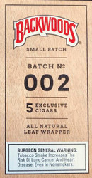 Altadis Backwoods Cigars Small Batch 002, close-up of the cigar packaging label showcasing the batch number, quantity, and natural leaf wrapper details. Altadis Backwoods Cigars Small Batch 002, close-up of the cigar packaging label showcasing the batch number, quantity, and natural leaf wrapper details.