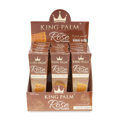 King Palm Rose Petal Gold Cones King Size 15/3 Ct, display of packaged natural rolling cones with rose petal flavor in a cardboard box. King Palm Rose Petal Gold Cones King Size 15/3 Ct, display of packaged natural rolling cones with rose petal flavor in a cardboard box.