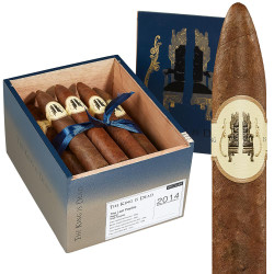 Caldwell Collection The King Is Dead The Last Payday Cigars 24Cnt. Box, a wooden box filled with cigars wrapped in cream labels and tied with a blue ribbon, and a large, unlit cigar with a matching label. Caldwell Collection The King Is Dead The Last Payday Cigars 24Cnt. Box, a wooden box filled with cigars wrapped in cream labels and tied with a blue ribbon, and a large, unlit cigar with a matching label.