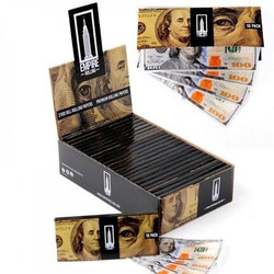 Empire Papers Empire Rolling Papers Full Box, black open box display with multiple rolling papers and fake hundred-dollar bills for display. Empire Papers Empire Rolling Papers Full Box, black open box display with multiple rolling papers and fake hundred-dollar bills for display.