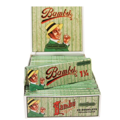 Big Bambu Papers Big Bambu Organic Hemp Cigarette Papers 1 1/4, display of multiple packs of organic hemp rolling papers in a box, with vintage-style packaging featuring a man in a hat.