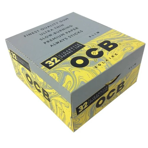 OCB Solaire Rolling Paper Slim + Tips Box 32, pack of ultra-thin cigarette rolling papers with tips, yellow and gray packaging design.