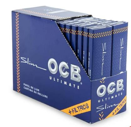 OCB Rolling Papers OCB Ultimate Cigarette Papers King Size Slim + Tips, blue box containing 32 packs of slim rolling papers with tips suitable for rolling cigarettes.