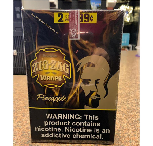 Zig Zag Wraps Pineapple 2 for 99c, packaging of premium pineapple flavor wraps with warning about nicotine content and retailer sticker on top.