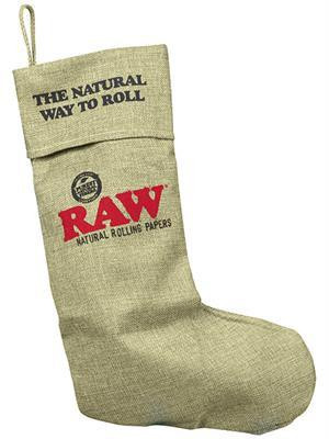 RAW Canvas Holiday Stocking, a beige fabric Christmas stocking with printed text and logo