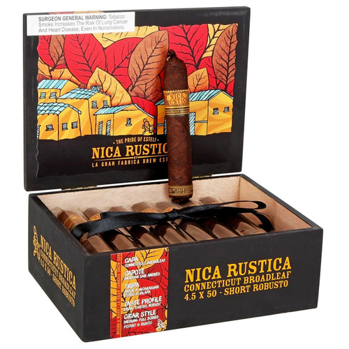 Nica Rustica Broadleaf Short Robusto Cigars 25 Ct Box, opened box featuring 25 cigars with dark wrapper and decorative bands, with an illustrated background of colorful houses and autumn leaves.