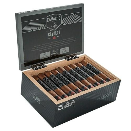 Camacho Coyolar Rothschild Cigars 25Ct. Box, a black and wood-tone cigar box filled with neatly arranged Rothschild cigars displaying their dark, oily wrappers.