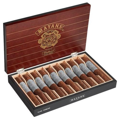General Cigar Mayans M.C. by CAO Cigars 10Ct. Box, a wooden box containing ten cigars with decorative bands inside a luxurious presentation box.