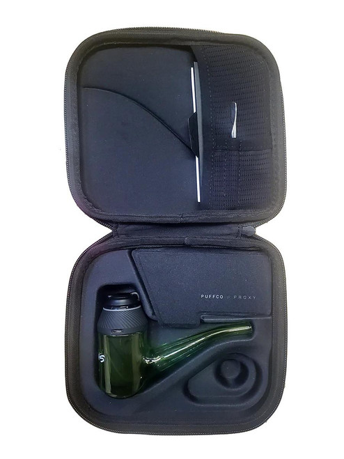 Ruckus Glass Proxy Glass Attachment- Green, inside view of a black carrying case with protective foam, containing a green glass proxy with a black top and a black cleaning cloth, suitable for vaping devices.