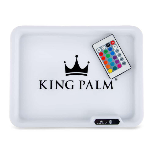 King Palm Glow Rolling Tray, white tray with black king crown logo and a remote control for lighting features.