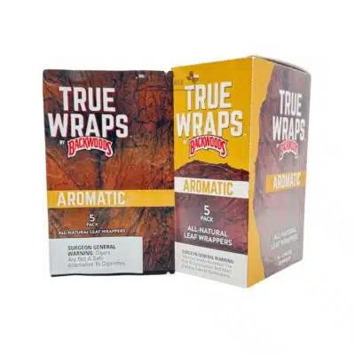 Altadis True Wraps by Backwoods Aromatic Leaf Wraps, 16/5 packs, displayed in retail packaging with one box showing a rustic, natural leaf design and the other featuring a yellow and purple design.