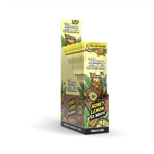 Blazy Susan Honey Lemon Tea Leaf Wraps 25/2 Ct, a colorful box of herbal tea leaf wraps featuring honey lemon flavor, with tea leaf illustrations and resealable pouch design.