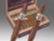 AVO Cigars Heritage Short Robusto 20 Ct. Box 4.00X56, two cigars with silver bands and brown wrappers, with an open box containing additional cigars in the background.