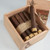 Diesel Unlimited Maduro cigars 20Ct. Box, wooden box with several dark brown cigars and a single cigar lying on top.