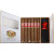 Romeo Y Julieta Cigars 1875 Exhibition #3 Cigar Sampler with Cigar Rest, featuring six cigars in a wooden box along with a red cigar punch cutter.