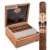Carlos Torano Exodus 1959 '50 Years' Box-Pressed Cigars 24Ct. Box, a wooden cigar box containing 24 boxed and unboxed cigars with a single cigar standing outside, showcasing the premium packaging and branding.