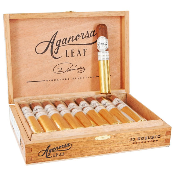 Casa Fernandez Aganorsa Leaf Signature Selection Robusto Cigars 20Ct. Box, wooden cigar box with 20 cigars arranged inside and one cigar out of the box, featuring gold and silver accents.