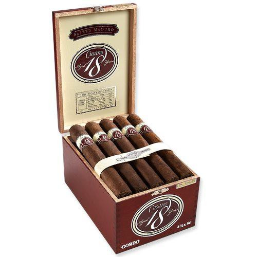Cusano 18 Gordo Maduro Cigars 18Ct. Box, opened wooden box displaying six cigars with band labels, inside cover showing logo and product details.