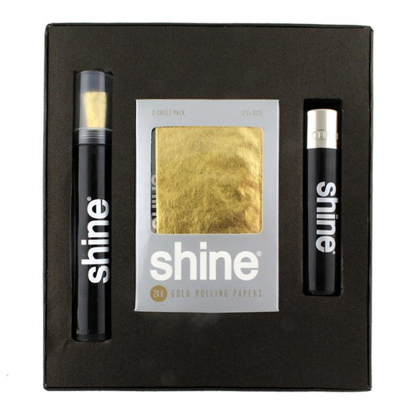 Shine Rolling Paper Shine 24K Gold Rolling Paper Gift Box, includes two black rolling papers and gold foil wrapping paper for luxurious rolling experiences.