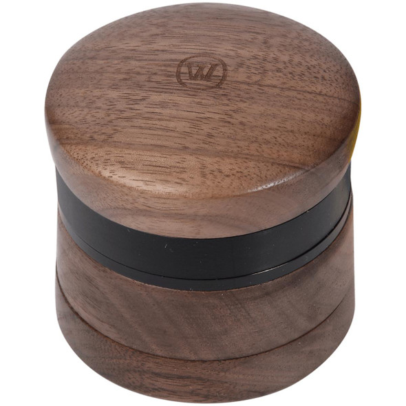 Marley Natural 2.3" Black Walnut Wood 3 Piece Grinder, with a round top featuring a Marley Natural logo engraved, made of black walnut wood, showcasing a smooth, polished finish.