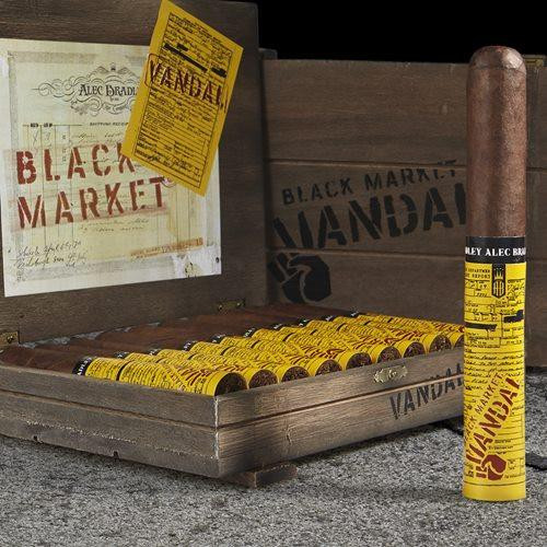 Alec Bradley Black Market Vandal Toro Cigars 10Ct. Box, featuring a wooden cigar box filled with torpedo-shaped cigars wrapped in yellow and black bands, and an individual cigar with a similar band standing upright next to the box.