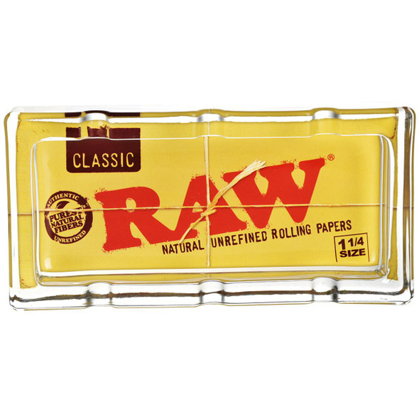 RAW Classic Pack Glass Ashtray, 6x3 inch transparent glass ashtray with yellow RAW rolling paper packaging design.