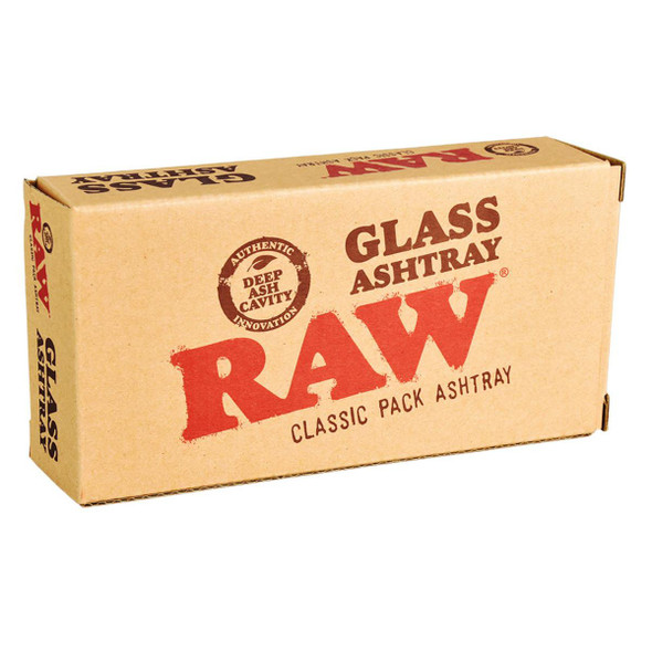 RAW Classic Pack Glass Ashtray, 6x3 inches, in a cardboard packaging box indicating authentic deep ash cavity design.