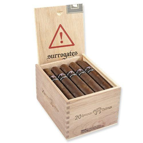 Surrogates by L' Atelier Cigars, a wooden box containing five cigars with a lid that has a warning symbol and the brand name.