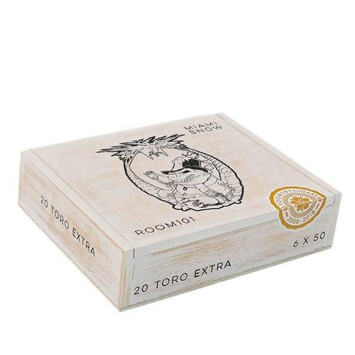 Room 101 Miami Snow Cigars, unopened cigar box with a vintage design and logo, containing 20 Toro Extra cigars.