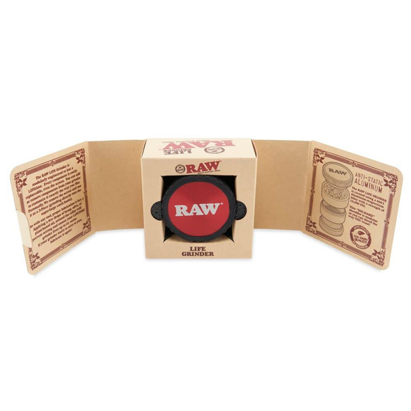 RAW LIFE Grinder Modular Rebuildable Grinder Red, product image showing a red and black REW LIFE Grinder in its beige packaging with detailed instructions inside.