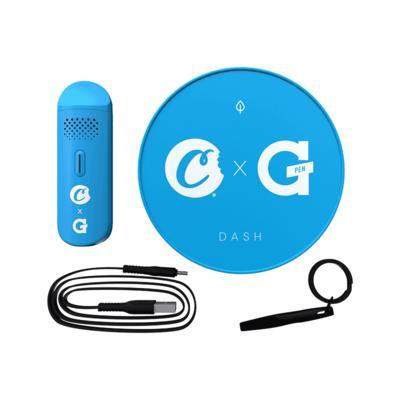 Cookies X G Pen Dash Blue, product image showing a blue portable vaporizer, a blue circular storage container with logos, a cleaning brush, and a lanyard.