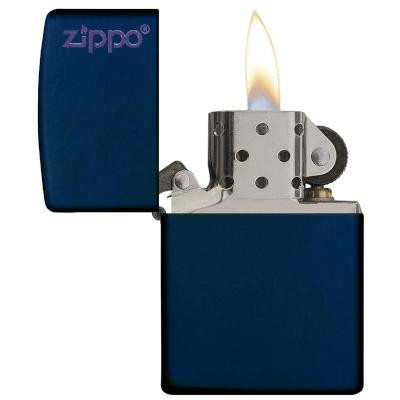 Zippo Matte W/ Zippo Logo, close-up of a blue matte Zippo lighter with the Zippo logo on the front and the lid open showing the ignition wheel and flame.
