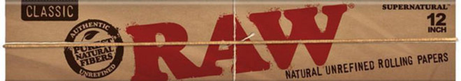 RAW Classic SuperNatural Rolling Paper 12 Inch 1Ct, image of a box of natural unrefined rolling papers with RAW branding in red and black on a cardboard packaging.
