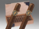 Undercrown Cigars Gordito 25 Ct. Box 6.00X60, two cigars with band and a wooden cigar box in the background. Undercrown Cigars Gordito 25 Ct. Box 6.00X60, two cigars with band and a wooden cigar box in the background.