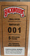 Altadis Backwoods Cigars Small Batch 001, wooden cigar box with red and black branding and label details.