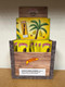 Altadis Backwoods Banana Cigars 40Ct Display, a cardboard display box with banana-flavored cigars, featuring a banana graphic and a warning label, arranged for sale. Altadis Backwoods Banana Cigars 40Ct Display, a cardboard display box with banana-flavored cigars, featuring a banana graphic and a warning label, arranged for sale.