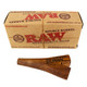 RAW Double Barrel Supernatural Wooden Cigarette Holder, a finely crafted wooden cigarette holder with a natural finish and the RAW logo engraved, positioned beneath its cardboard packaging.