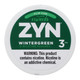 Zyn Nicotine Pouches Wintergreen 3 Mg 15/5 Tins, round white tin with green label featuring the ZYN logo, wintergreen flavor, and nicotine content.