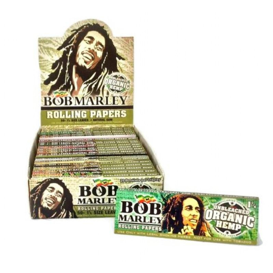 Bob Marley Papers Bob Marley Cigarette Papers Organic Hemp King Size 50Ct, display of multiple packs of rolling papers featuring Bob Marley's image and reggae-themed design.