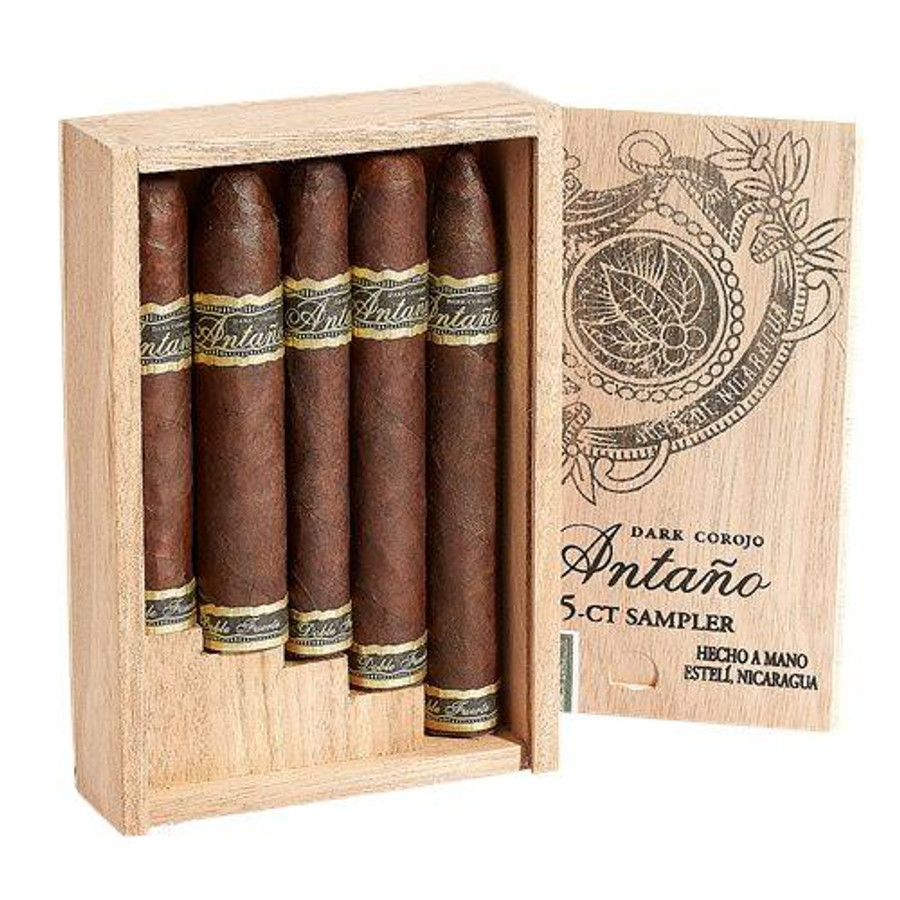 Drew Estate Joya de Nicaragua Antano Dark Corojo Cigar Sampler, wooden box containing five cigars with dark brown wrappers and branded bands.