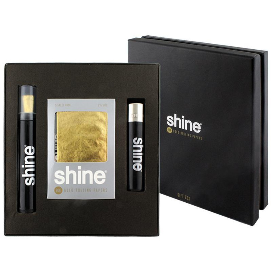 Shine Rolling Paper Shine 24K Gold Rolling Paper Gift Box, black gift box with included rolling papers, gold foil rolling paper, and accessories.