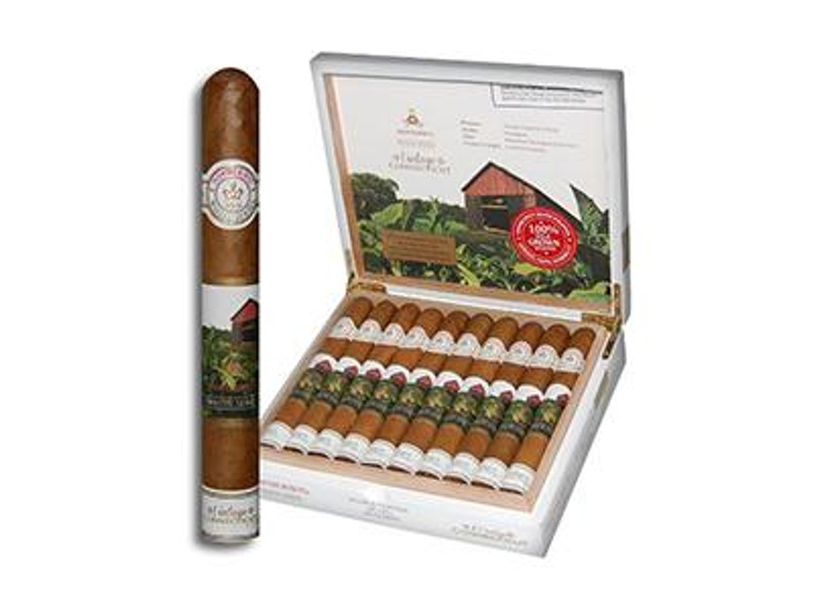 Montecristo White Vintage Connecticut Cigar Double Corona 20 Count Box 6.25x50, opened with cigars displayed inside and one cigar outside the box showing the band.