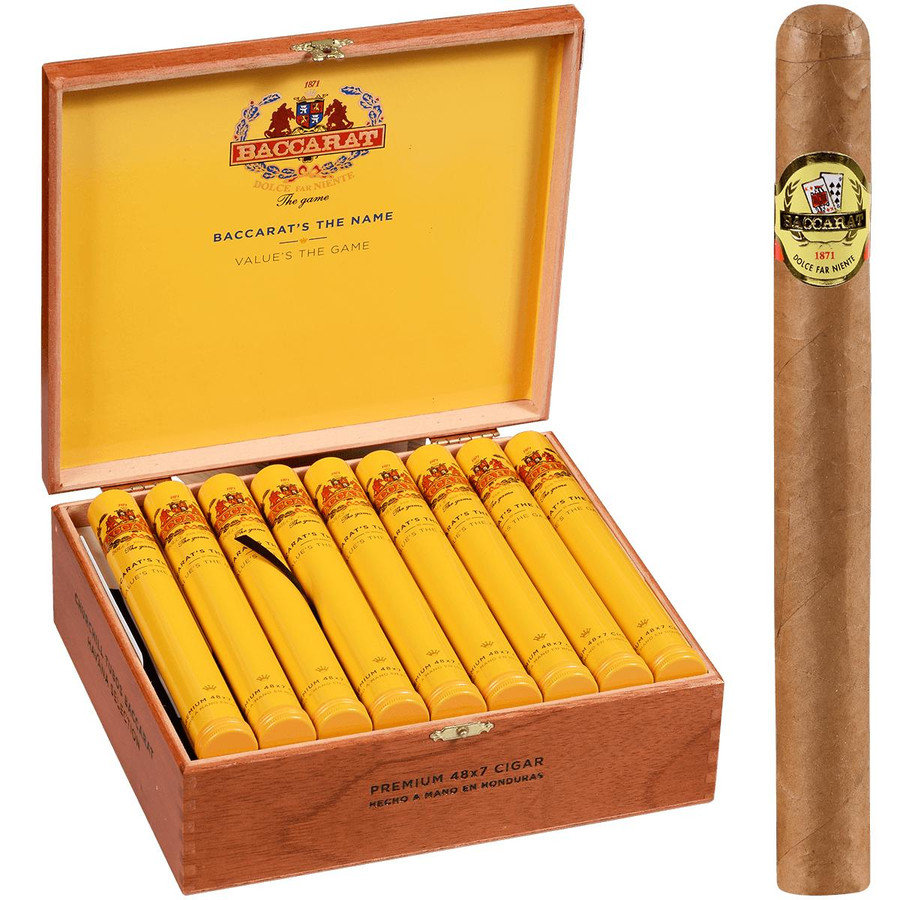 Baccarat Cigars Churchill Natural Tubo 25 Ct. Box 7.00X48, image of a wooden box open to display 25 yellow cigars with red and black labels, showcasing the product packaging and presentation. Baccarat Cigars Churchill Natural Tubo 25 Ct. Box 7.00X48, image of a wooden box open to display 25 yellow cigars with red and black labels, showcasing the product packaging and presentation.