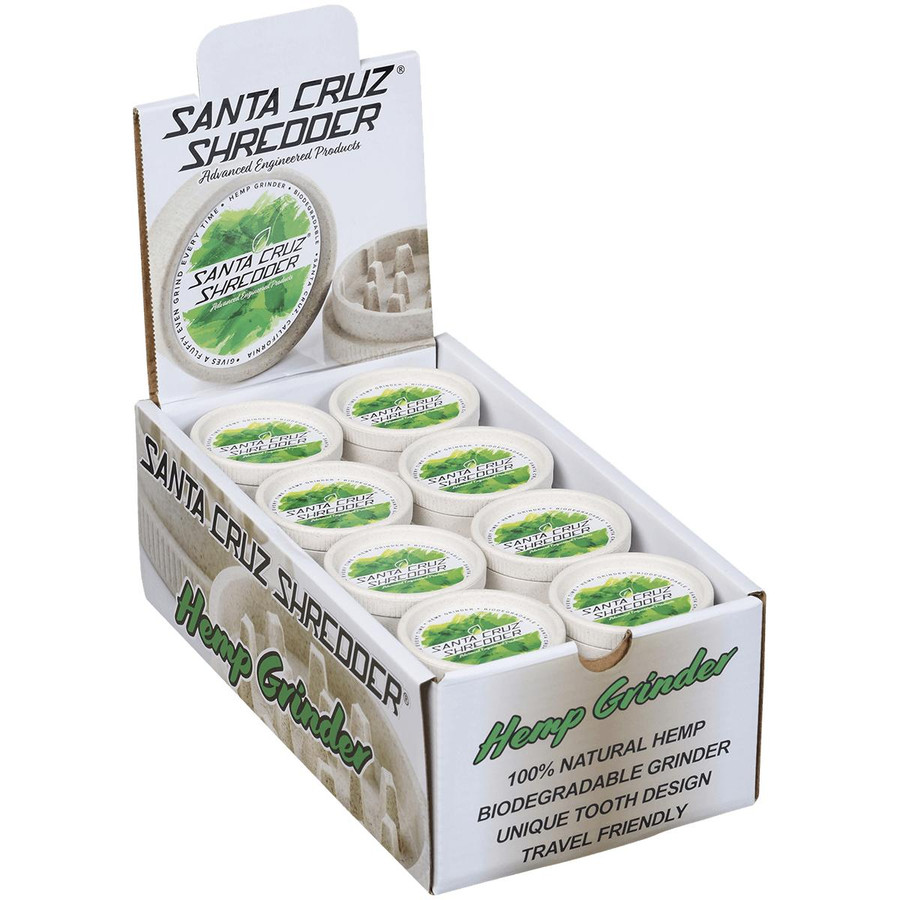 Santa Cruz Shredder Hemp Two Piece Grinder 24 Ct. Display, showing multiple hemp grinders in a retail box with green and white branding and product descriptions.