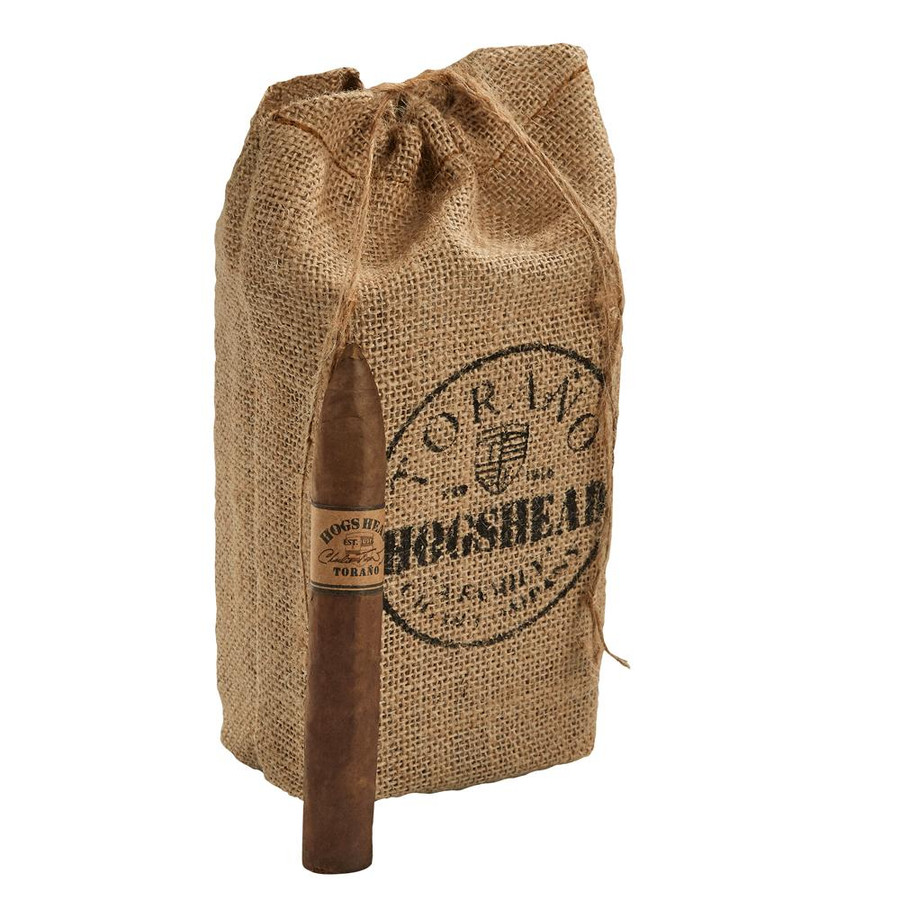Carlos Torano Hogshead Torpedo Cigars Pack of 20, brown cigar with orange and black label, leaning against a burlap sack with the logo. Carlos Torano Hogshead Torpedo Cigars Pack of 20, brown cigar with orange and black label, leaning against a burlap sack with the logo.