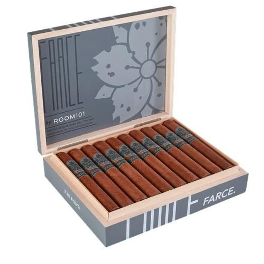 Room 101 FARCE Cigars, open cigar box displaying ten cigars with branded bands inside a wooden case with floral design in the lid.