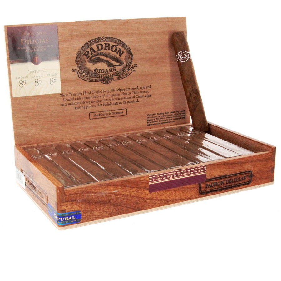 Padron Series Delicias Natural Cigars 26Ct. Box, wooden cigar box with cigars inside and detailed branding and labels. Padron Series Delicias Natural Cigars 26Ct. Box, wooden cigar box with cigars inside and detailed branding and labels.