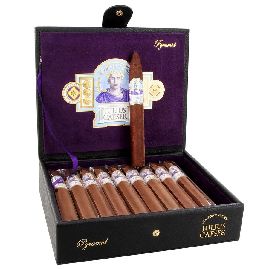 Diamond Crown Julius Caeser Pyramid Cigars 20 Ct. Box, luxurious cigar box with a single cigar placed on top and 20 individually wrapped cigars inside, featuring purple and gold branding.