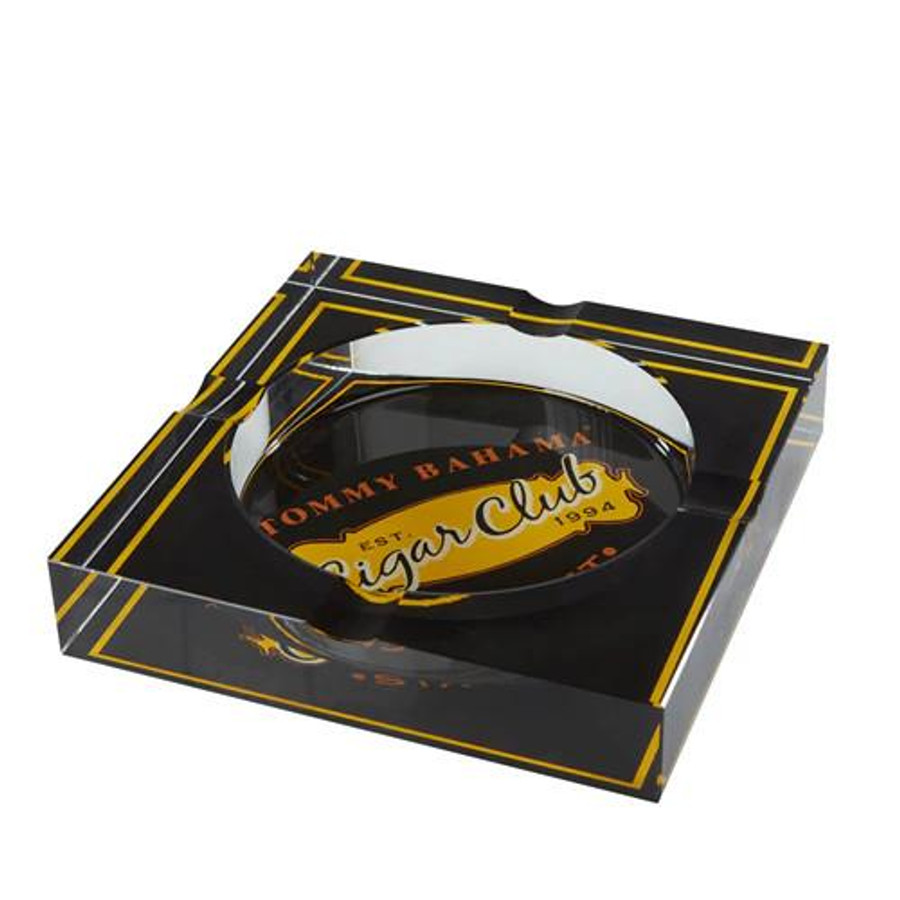 Tommy Bahama Cigar Club Glass Ashtray, round glass ashtray with Tommy Bahama Cigar Club logo, placed in black and gold packaging.